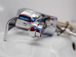 Faucet repair and replacement plumbing services in Houston by Sweet Septic Disconnected outdoor faucet fixture prepared for plumbing repair or replacement