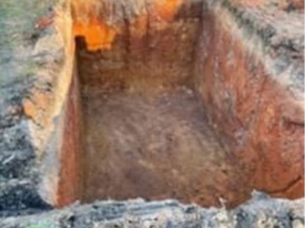 Septic tank excavation in progress at residential property in Houston Texas Septic tank excavation in progress at residential property in Houston Texas